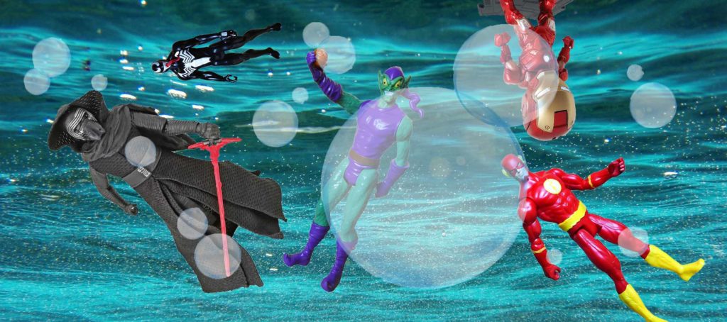 action figures in a fish tank